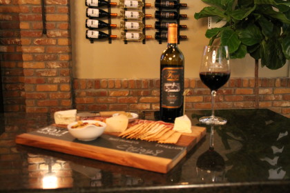 Foyt's California made wine is served with local Indianapolis cheeses. (Sarah Stierch, CC BY 4.0)