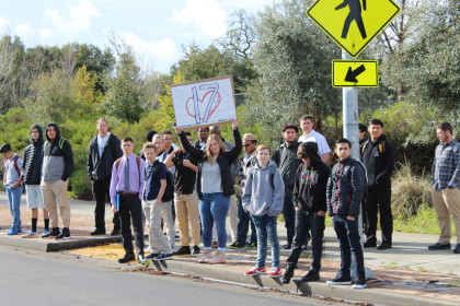 Students at Hanna Boys Center observe Wednesday's Walk Out. 