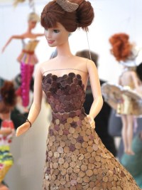 Barbie wears a gown made of cork designed by Kaala Stewart