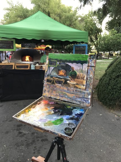 Keith Wicks creates a plein air portrait of Mike Zakowski, “Mike the Baker,” at Sonoma’s Tuesday Night Farmers Market.