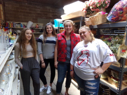 Megan, Olivia, Annie and Eden model their haul. The incoming Sonoma Valley High School seniors grabbed slacks, jeans, sweater top, colorful vest, and jersey.