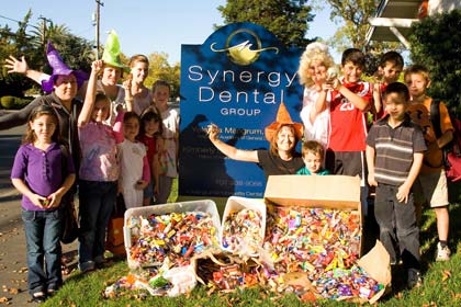 submitted photo:  Synergy Dental bought back a whopping 200+ pounds of candy from local kids.