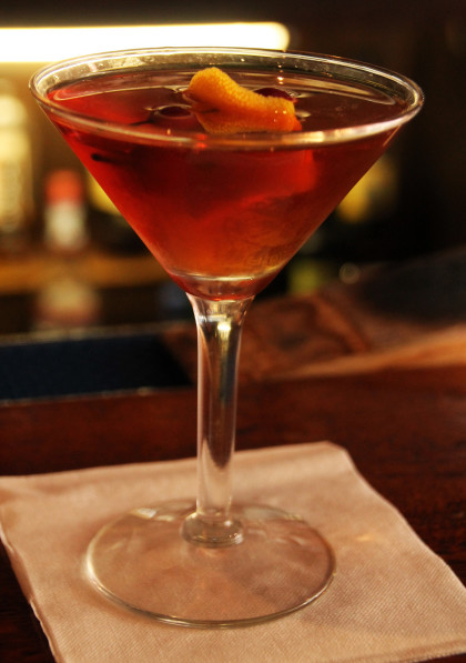 Oak-fired Manhattan created by Trevor Bach at the Plaza Bistro