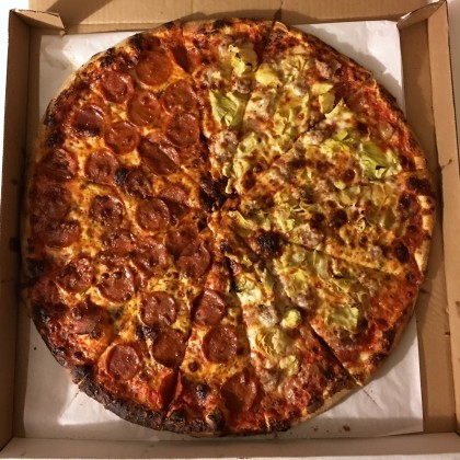 Half pepperoni, half artichoke and sausage - a large pizza at New Haven Apizza Shop in Sonoma, California